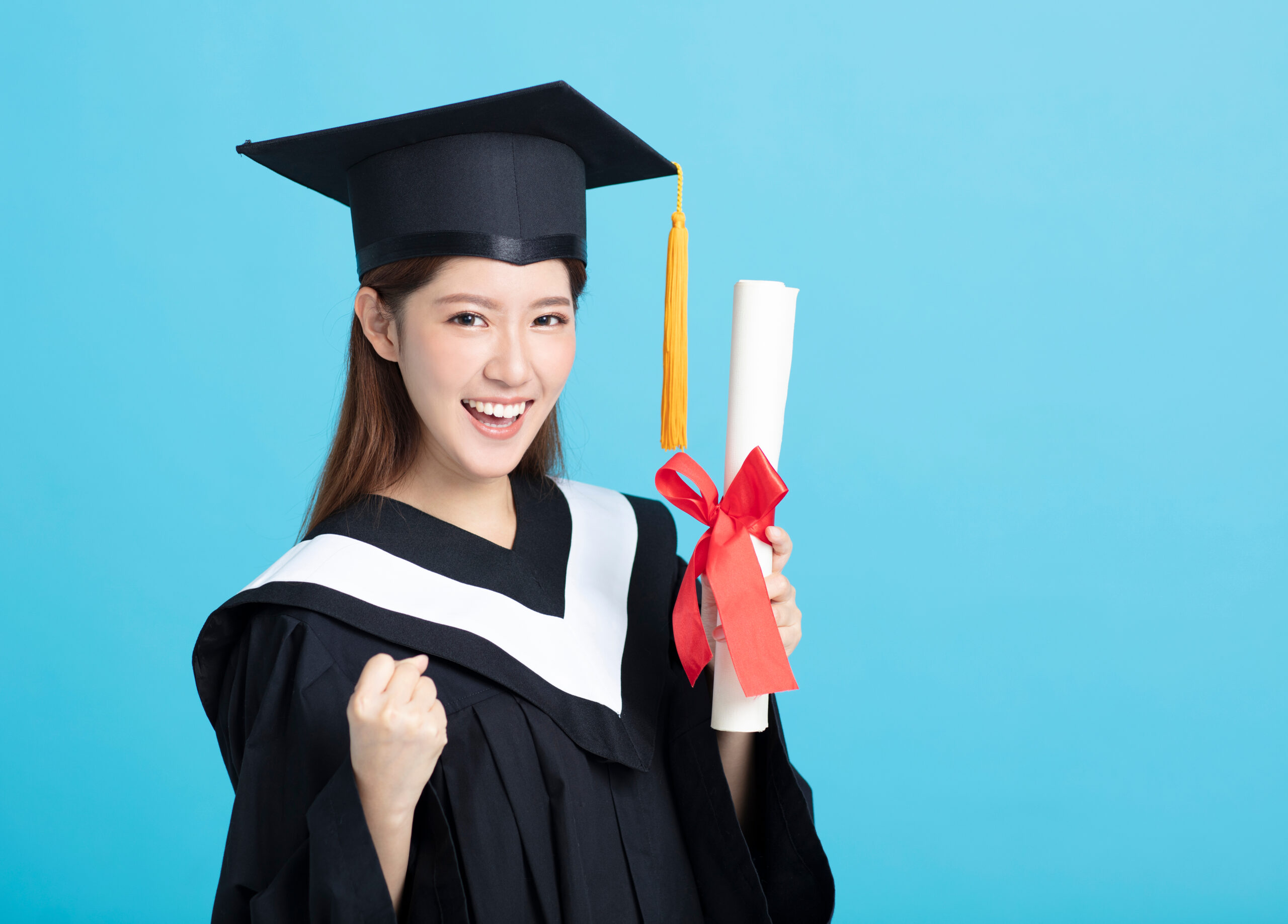happy,asian,female,graduate,student,holding,diploma,isolated