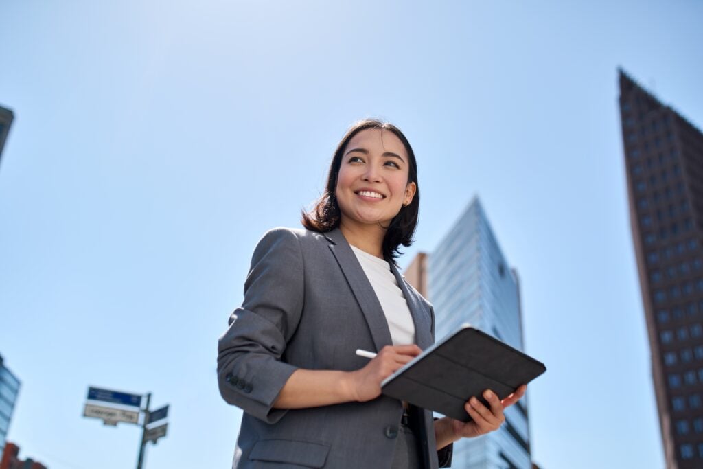 smiling,young,asian,business,woman,leader,entrepreneur,,professional,manager,holding