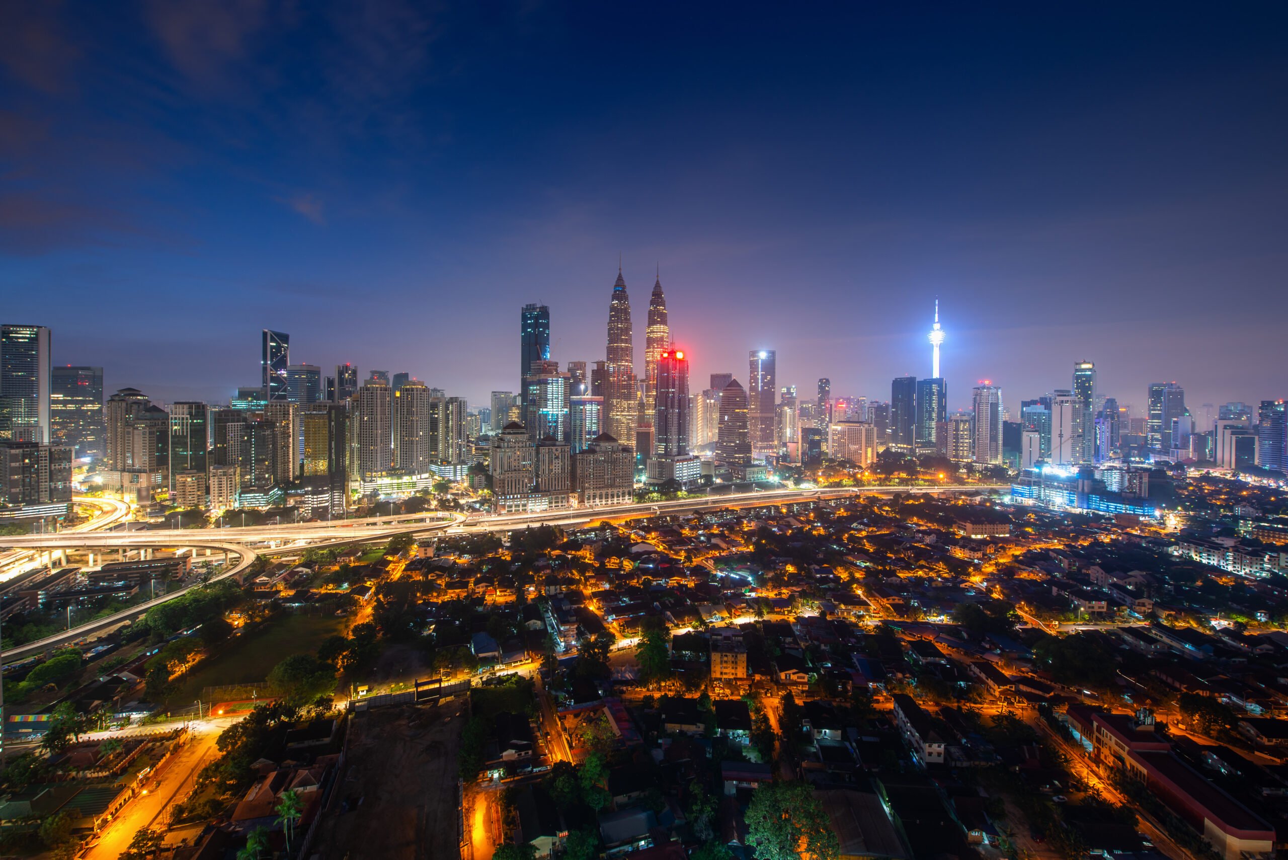 kuala,lumpur,city,skyscraper,and,street,with,nice,sky,twilight